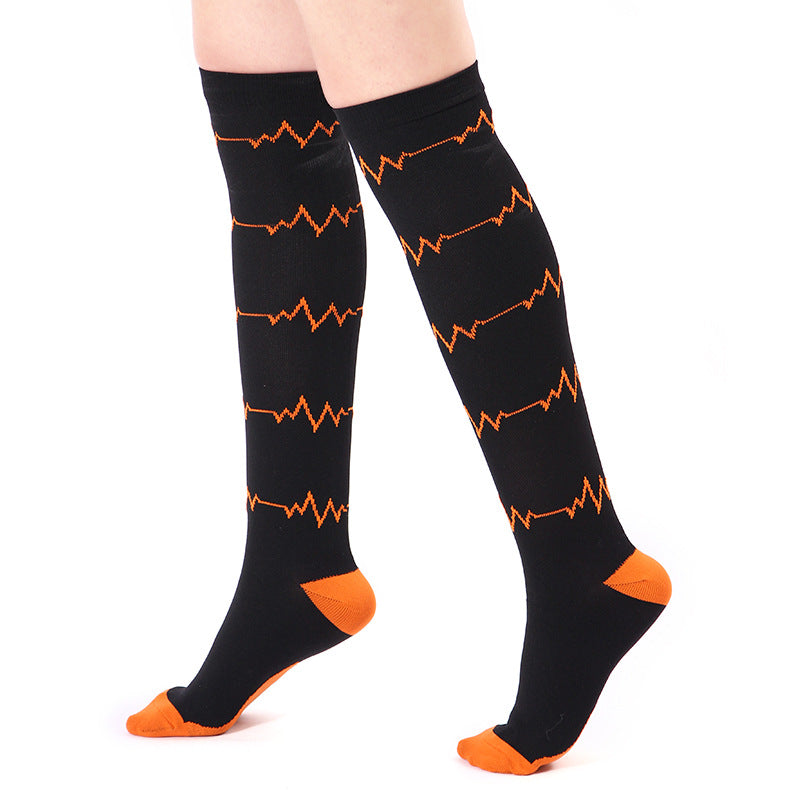 Black compression socks with orange ekg pattern socks