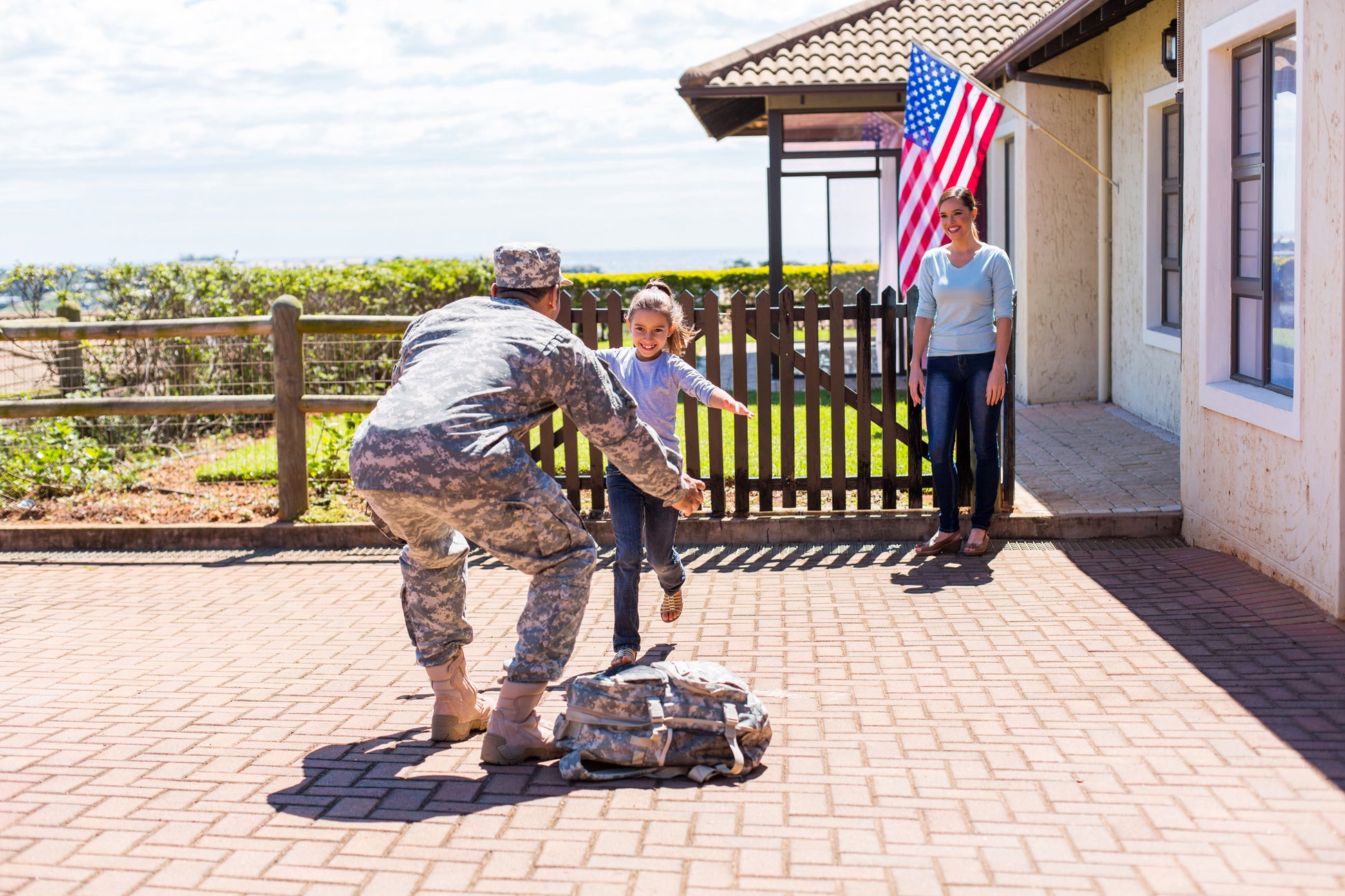 A man in fatigues come home from deployment