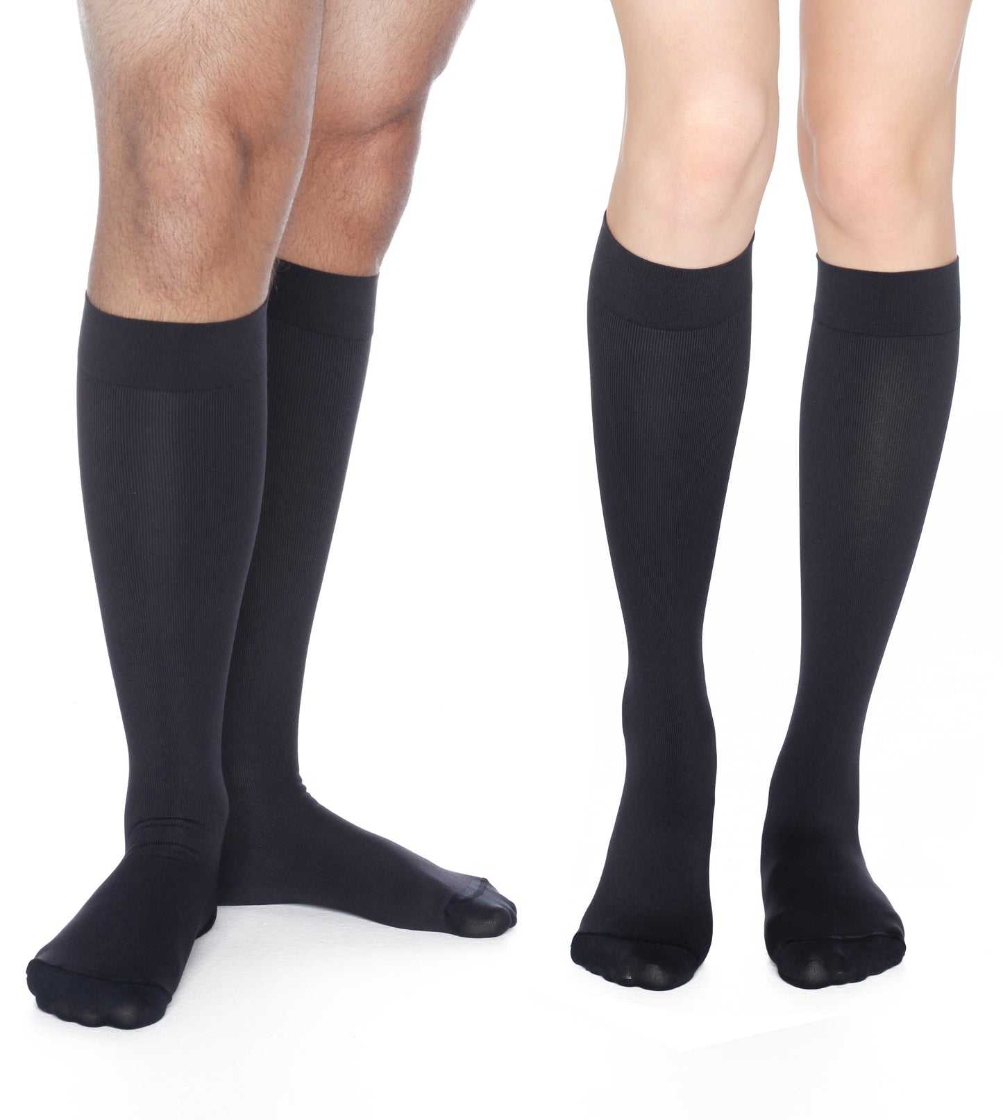 man and woman in midnight Rejuva CoolMax knee-high compression socks