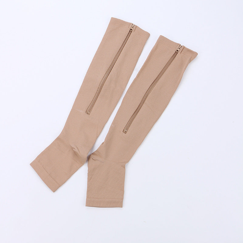 EZ-Zip zipper compression sock shown in beige laying flat